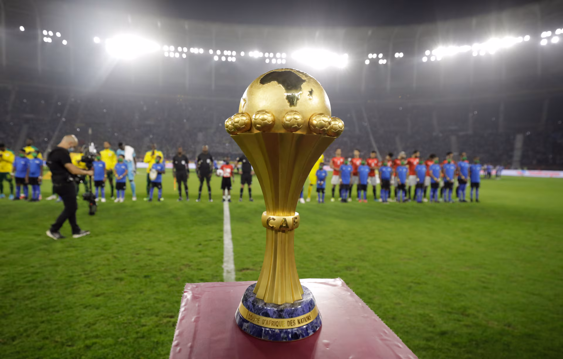 A high-quality image of Maracanã Stadium with its LED lighting in action during a football match.
