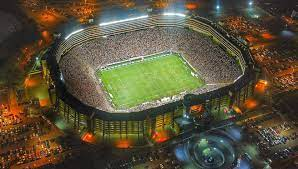LED lighting at Estadio Monumental illuminating a football match.